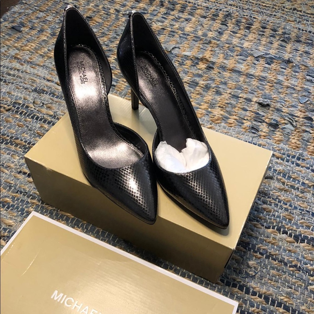 Brand new. Never worn. Michael Kors. Metallic Embossed Leather. Size 9.5